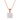 Rose gold necklace with a clear gemstone pendant on a white background